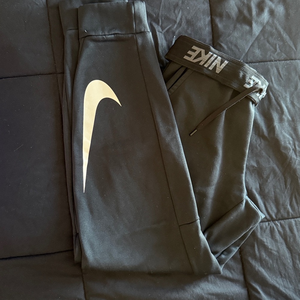 Nike dri-fit black Joggers with white Swoosh